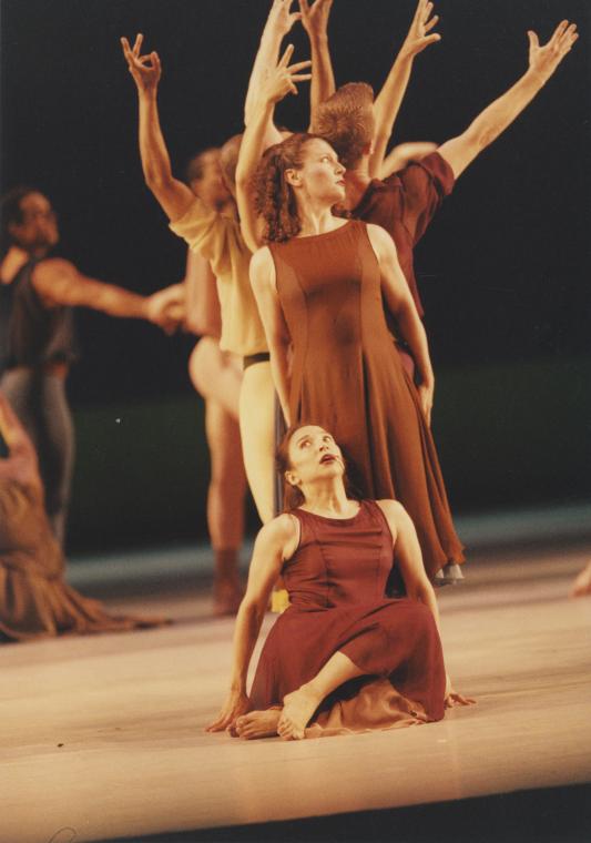 June Omura (seated). Rachel Murray, and the company in "L'Allegro, il Penseroso ed il Moderato," 1997