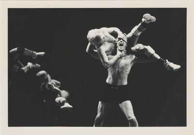 Donald Mouton and Rob Besserer in "Championship Wrestling after Roland Barthes" from "Mythologies," 1989